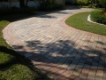 These pavers, view #10, after drying and the application of a satin acrylic sealer the driveway looks brand new!