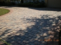 These pavers, view #9, after drying and the application of a satin acrylic sealer the driveway looks brand new!