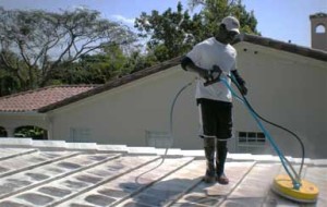 Rotary surface cleaner on tile roof